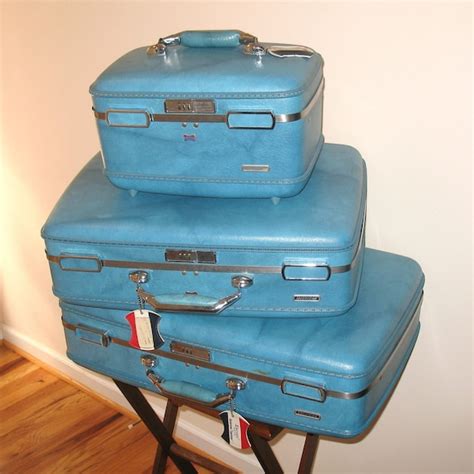 American escort vintage luggage history  Color: Red